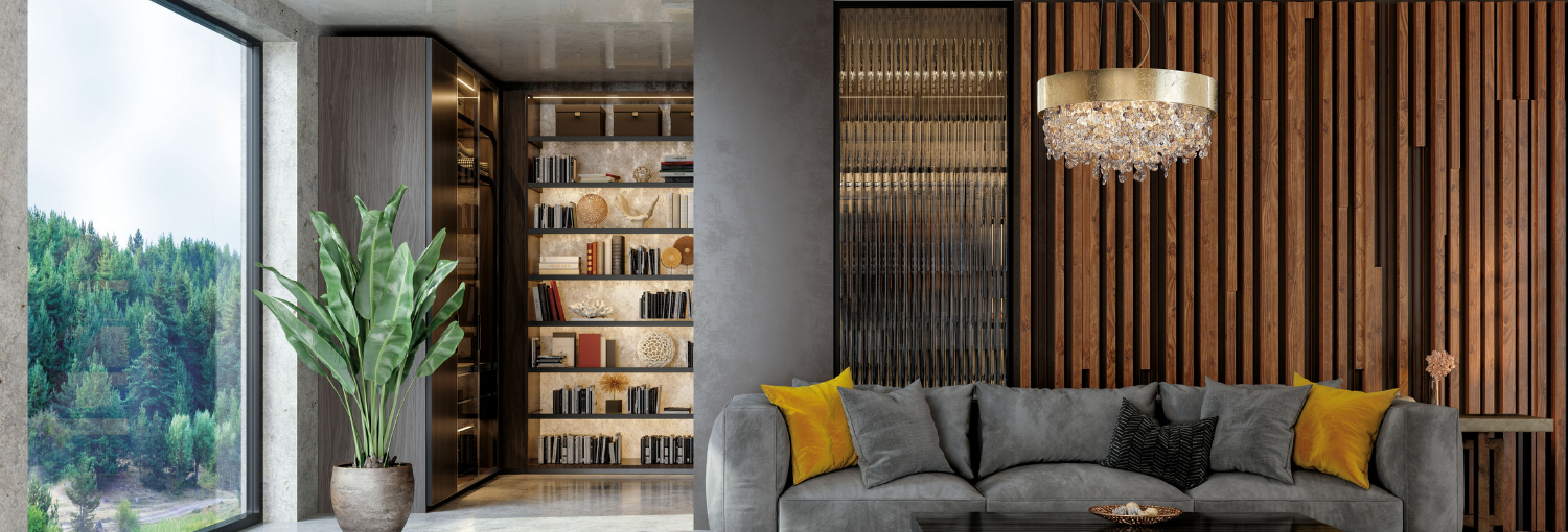 Graue Pendelleuchte Acorn von Northern Lighting vor einer hellen Ziegelwand